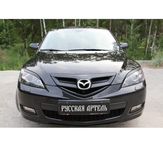 REM3016900 — Накладкиреснички на передние фары русская артель для MAZDA 3 хэтчбэк 20032008 гв (вариант 2) REM3016900 РУССКАЯ АРТЕЛЬ